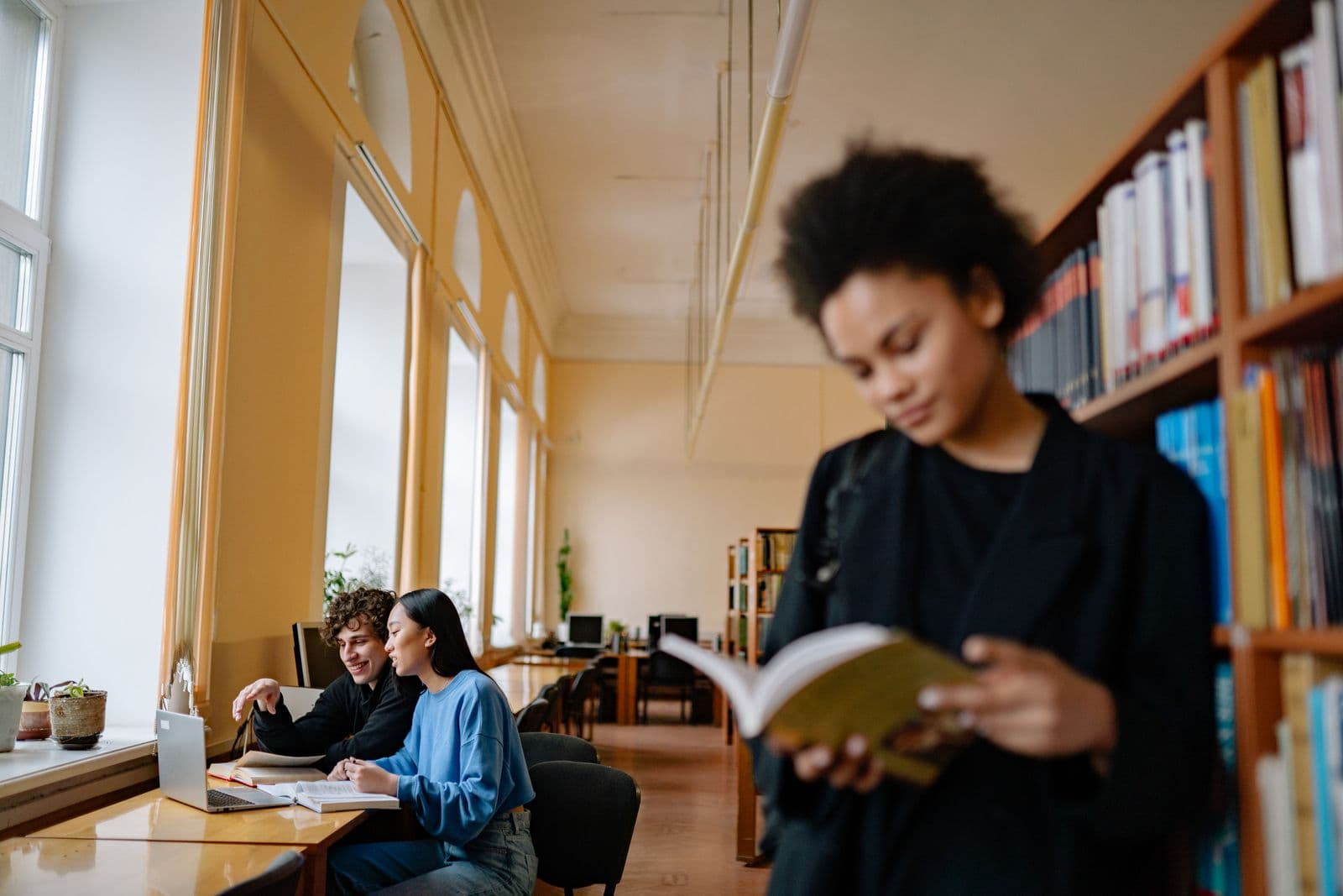 Students studying together in a university library